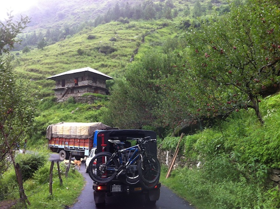 To Sarahan behind trucks