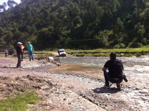 Fording the river at Sadhupul